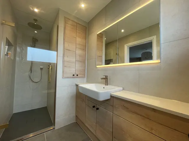 Brass Accessories & Wood-Grain Vanity